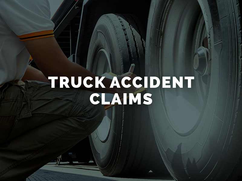 Claims adjuster looking at truck accident