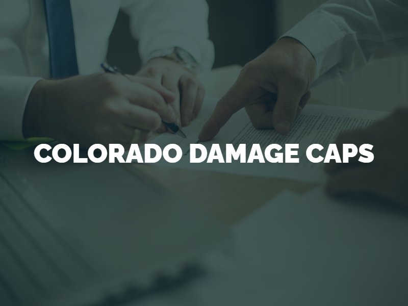 Men discussing Colorado damage caps
