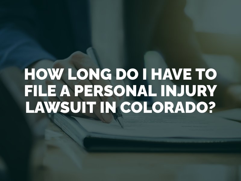 Man filling out paperwork for an injury claim in Colorado